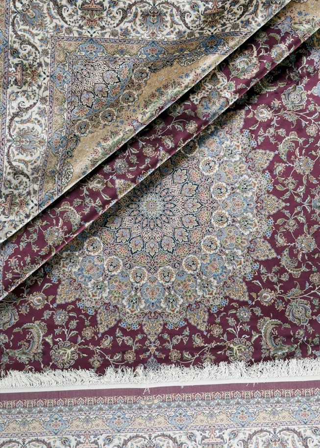How Persian Rugs Are Made: Art and Tradition A Red Persian Rug with floral motifs, showcasing the intricate patterns typical of traditional designs. Image courtesy of Afra Rugs.