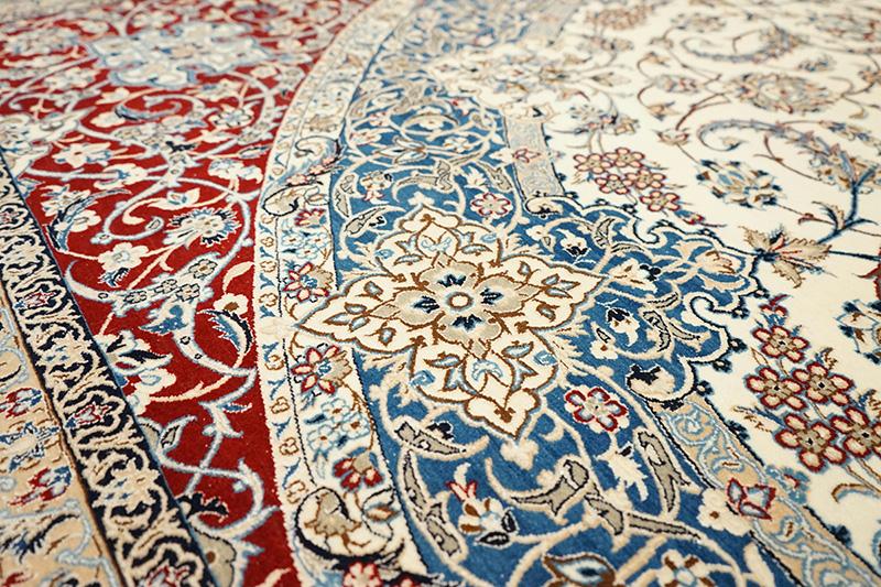 Showcased are the sophisticated borders and central patterns of a traditional rug