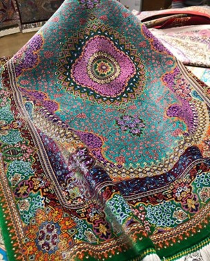 Unveiling the Elegance of a Qum Silk Carpet The intricate details and mesmerizing patterns on this rug are simply stunning. Every square inch tells a story of craftsmanship.